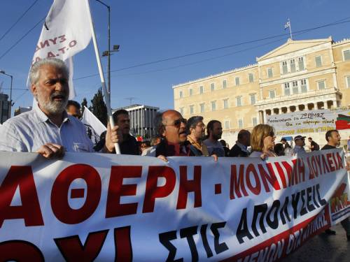 The Greek parliament approved 15,000 civil service layoffs in return for more EU/IMF bailout money. (AAP)