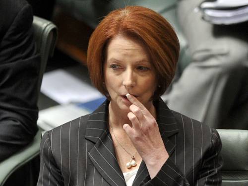 The PM is refusing to discuss accusations regarding her resignation from a law firm in 1995. (AAP)