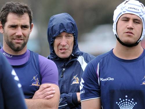 Storm coach Craig Bellamy (C) may rest players for their final round NRL clash with Wests Tigers. (AAP)