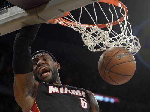 LeBron James has scored 39 points to lead Miami Heat to a 99-90 win over the LA Lakers. (AAP)