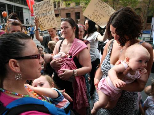 Hundreds of mums gathered in Sydney to protest against a TV host's comments about breastfeeding. (AAP)