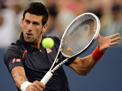 Novak Djokovic (pic) opened his US Open title defence with a first round thrashing of Paolo Lorenzi. (AAP)