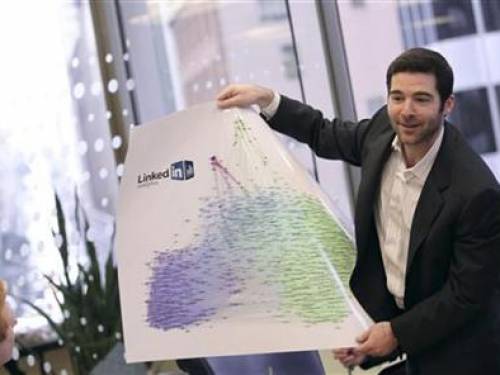 LinkedIn CEO Jeff Weiner displays a chart of graphics during the Reuters Technology Summit in San Francisco, California May 17, 2010. REUTERS/Robert Galbraith