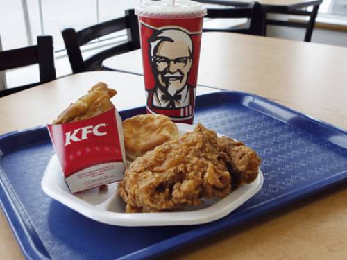 KFC and Pizza Hut, Nepal's only international fast-food chains, opened their first branches in the country three years ago, generating long queues of locals wanting to sample international cuisine. (AAP)