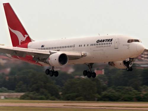 Qantas had some extra passengers hitching a ride. (Getty)