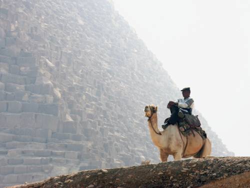A bomb explodes 150 metres from the pyramids outside Cairo. (Getty)