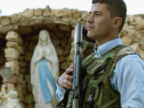 A file picture of a man patrolling in front of the church in Baghdad. (EPA)