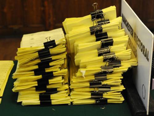 UK election ballot papers are sorted in Manchester. (Getty)