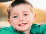 Injured Qld boy wakes from coma