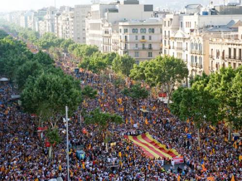 People holding up Catalan flags demonstrate against the sentence of the Spain's Highest court in Barcelona, Spain. (AP Photo)