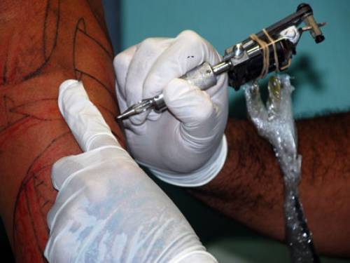 Man wanted a Yin and Yang symbol but ended up with a tattoo of a penis. The tattoo artist has been charged with two counts of assault occasioning bodily harm.