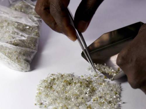 Checking raw diamonds at the Sierra Leone Central Bank in Freetown - Getty Images