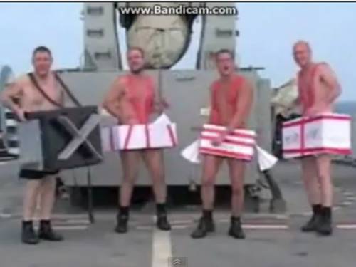The four-minute video shows servicemen and women acting and dancing along to the 1994 song on the helicopter carrier. (YouTube)