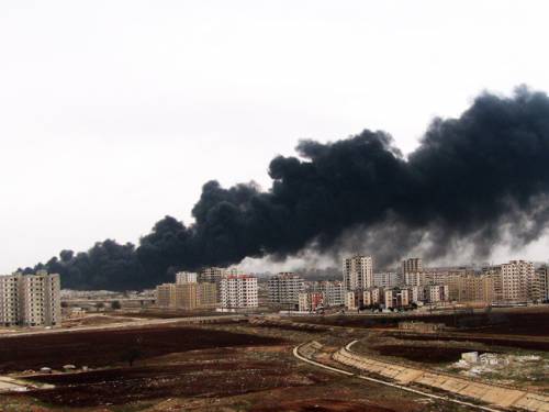 A Syrian government handout of the blast near Homs. (SANA/EPA)