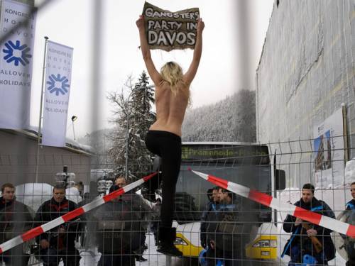 Protesters at the Davos forum. (Getty)