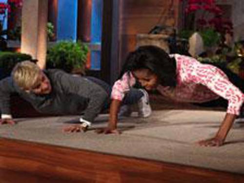 Michelle Obama performing push-ups with Ellen Degeneres on the 'Ellen' show. (Ellen)