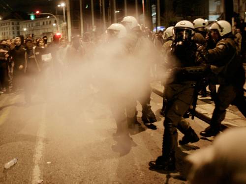 Riot police clash with protestors in Syntagma Square, during a protest against austerity measures in Athens. (Getty)