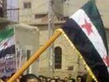 Security forces fire on huge Syria protests