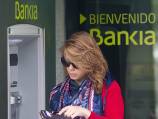 Spain says economy to shrink again