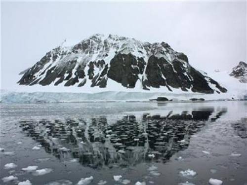 New research suggests sea ice is spreading as the ozone hole causes fiercer storms in Antarctica. (Reuters)