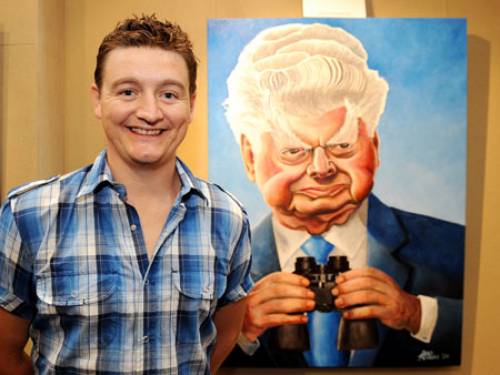 Bald Archy winner James Brennan with his portrait of trainer Bart Cummings (AAP)