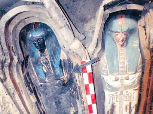 An undated handout picture released by the Egyptian Supreme Council of Antiquities shows a wooden coffin containing linen-wrapped mummy covered in cartonnage (AAP)