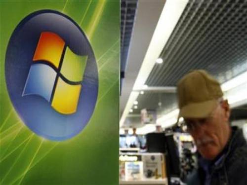 A man walks by the logo of Microsoft in a shop of Brussels in this September 17, 2007 file photo. The company issued software to fix 31 security flaws in its programs, a single-day record for the company whose products are targeted by hackers because they sit on the vast majority of computers. REUTERS/Sebastien Pirlet