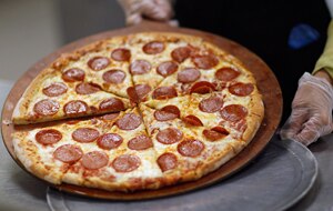 Only in America... pizza has been declared a vegetable. (AAP)