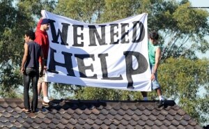 Protesters on the roof of Villawood earlier in the year. (AAP) 