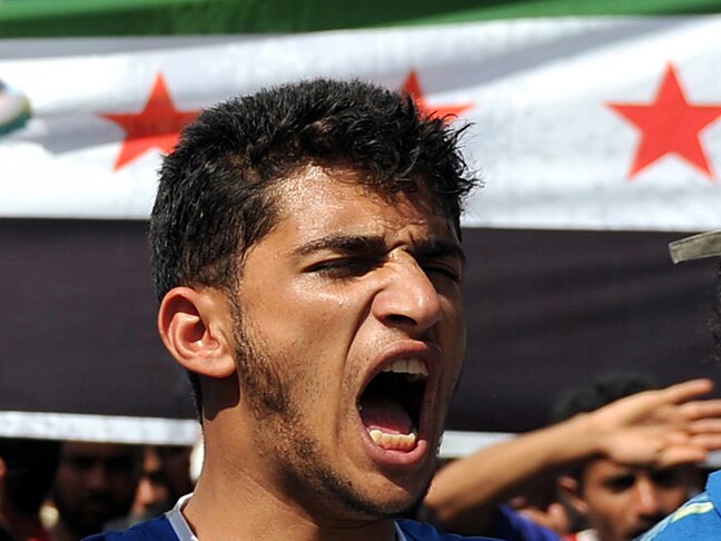 Rockets rain down on Homs
