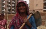Yalda Hakim reveals the extreme poverty behind the show of wealth at the Delhi Commonwealth Games.