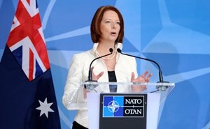 Prime Minister Julia Gillard addresses NATO in Brussels (AP)