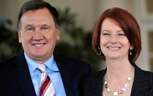 Gillard with her de facto partner Tim Mathieson. (AAP)