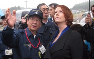 Minamisanriku Town Mayor Jin Sato and Australian Prime Minister Julia Gillard inspect the tsunami-ravaged town where an Australian relief team worked last month. (Richard Davis)