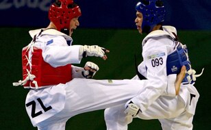 Logan Campbell of New Zealand (red) fights Sung Yu-Ch of Chinese Taipei at the Beijing Olympics. (Getty Images)