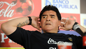 Argentina coach Diego Maradona tells his doubters to 'suck it' at the post-match press conference [GETTY]