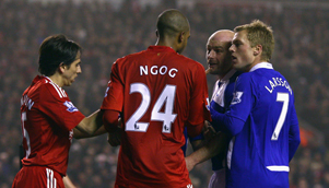 Liverpool's David Ngog and Birmingham's Lee Carsley discuss the finer points of diving [GETTY]