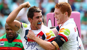 Mitchell Pearce, left, has scored four tries in two games for the Roosters this season [GETTY]