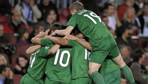 One for the little guys: Rubin Kazan players celebrate their victory over Barcelona at the Nou Camp [GETTY]