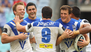 The Bulldogs celebrate their first win of the season, scoring 60 points in the process [GETTY]